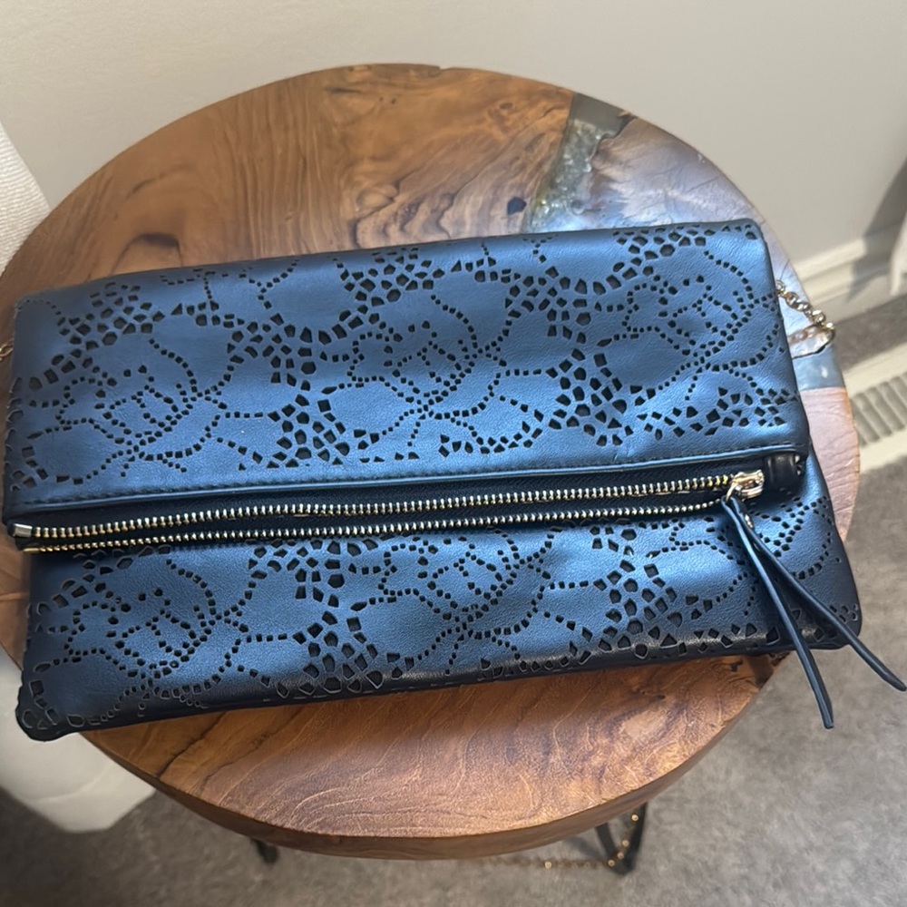 Elegant Black Laser-Cut Crossbody Clutch with Gold Accents. Urban Expressions